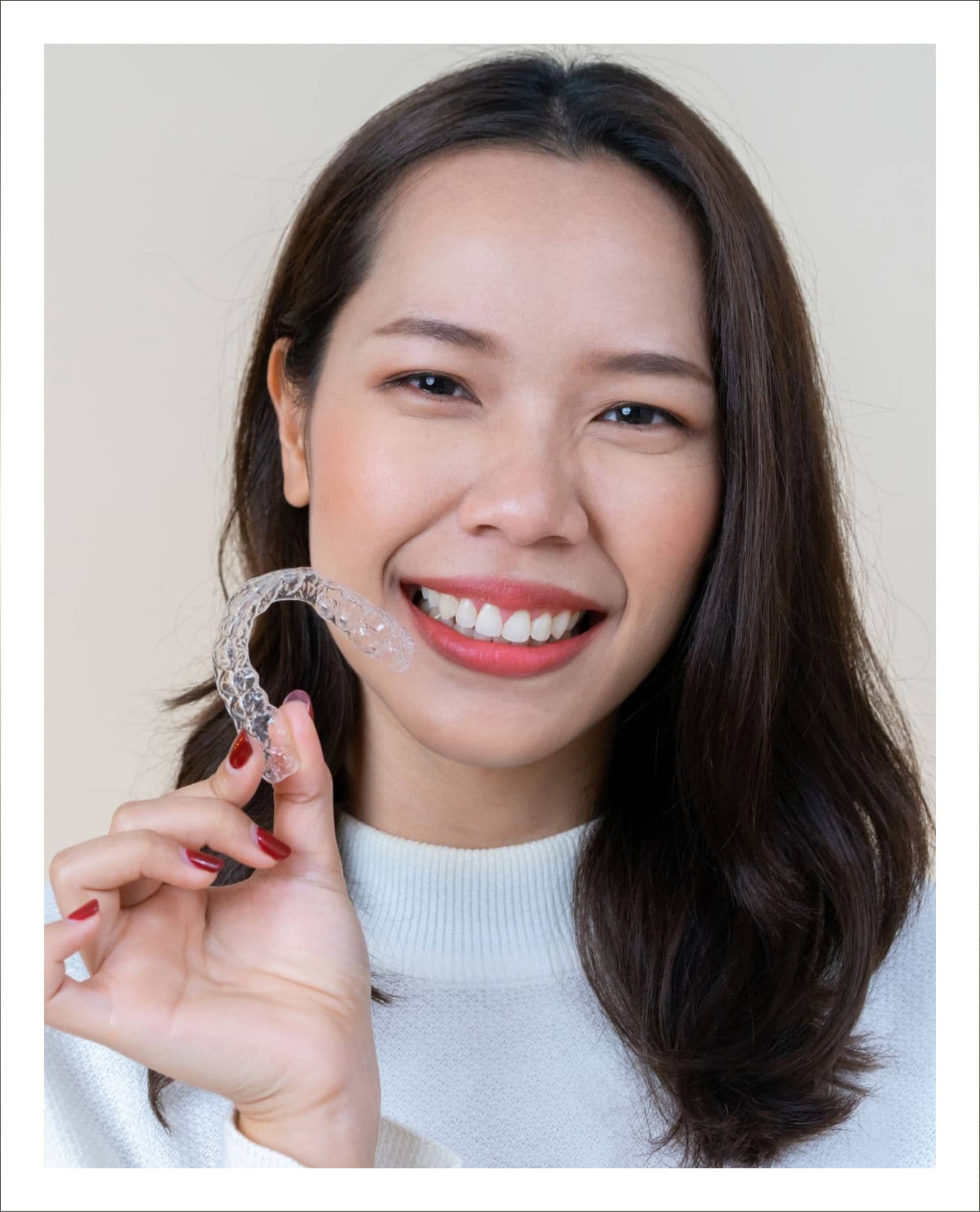 two girls smiling, hugging
